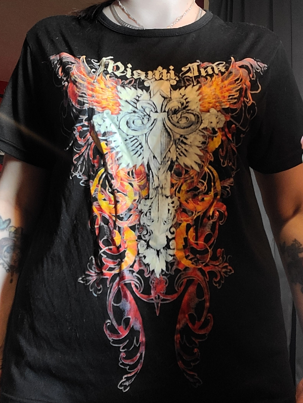 Miami Ink Graphic Tee with Orange & Yellow Winged Skull Design